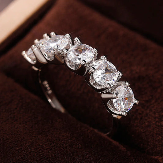 Eterna Row Moissanite Ring